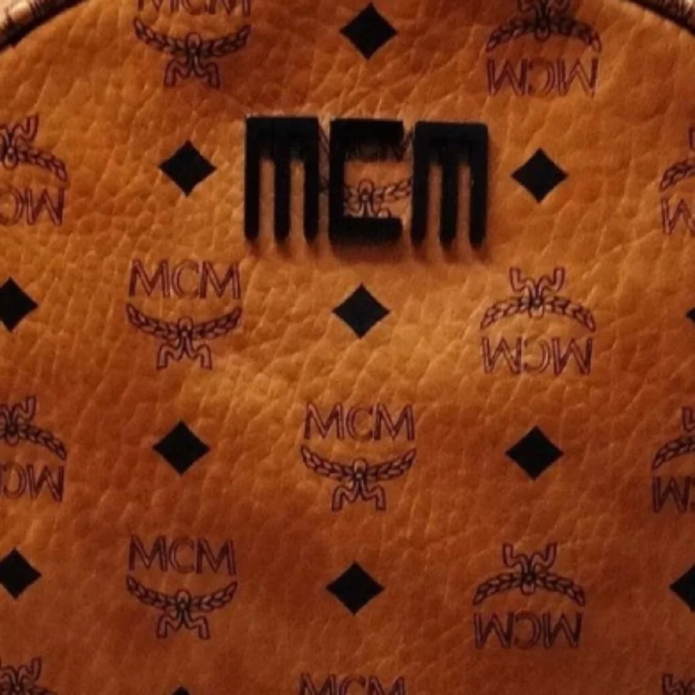 Authentic MCM BackPack Bag  Black Tan White leather pvc